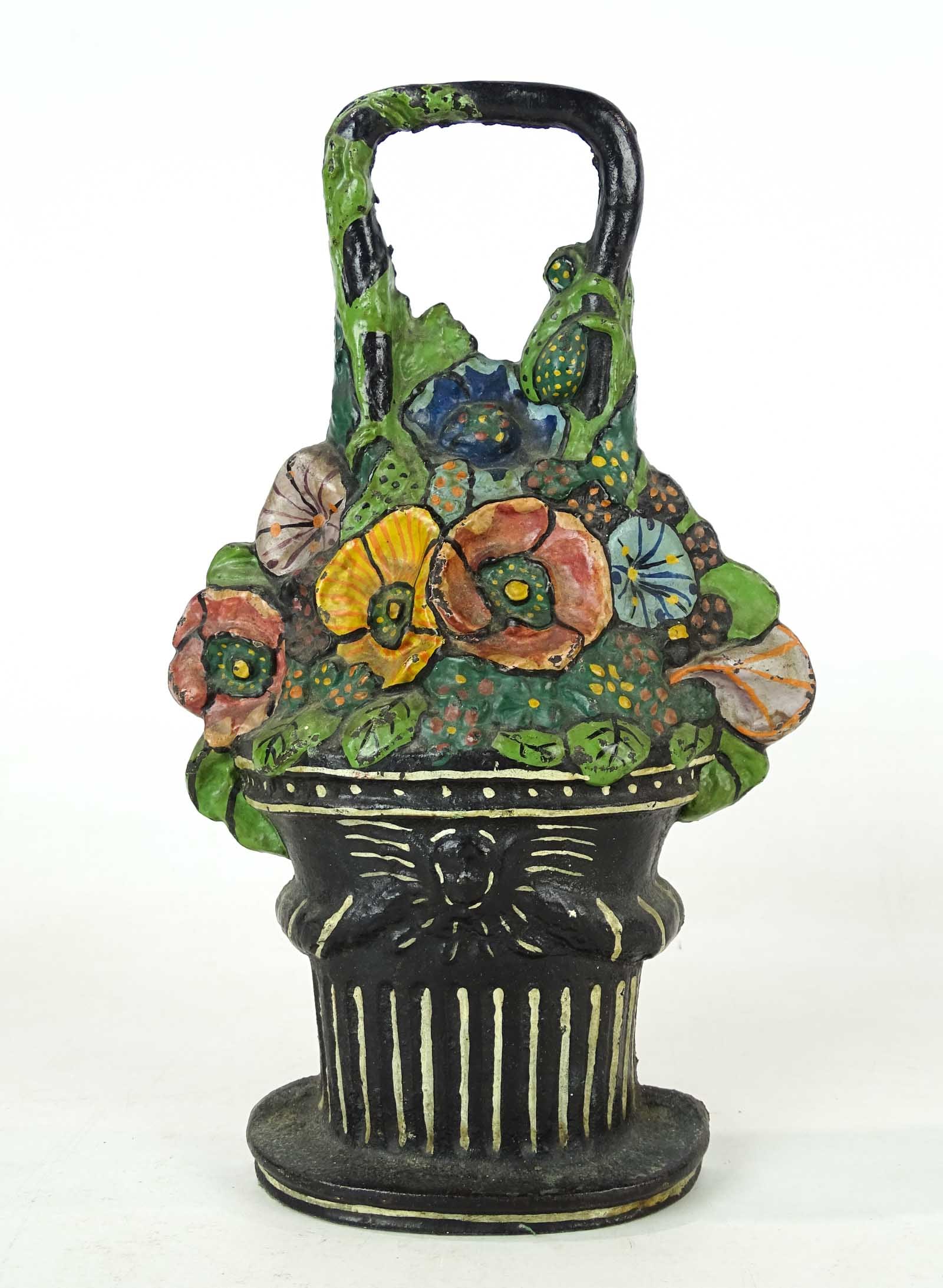 Pansies in Basket Doorstop: Cast iron Pansies in Basket doorstop. 11 1/2" Ht..