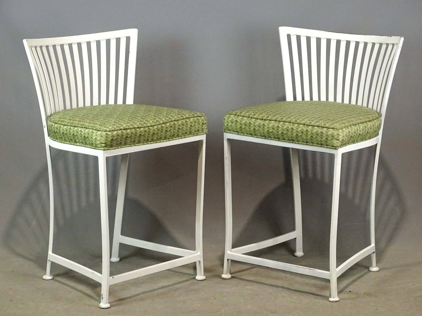 Pair of Metal Stools: Pair of metal upholstered seat stools. 24" seat Ht., 34 1/2" overall Ht..