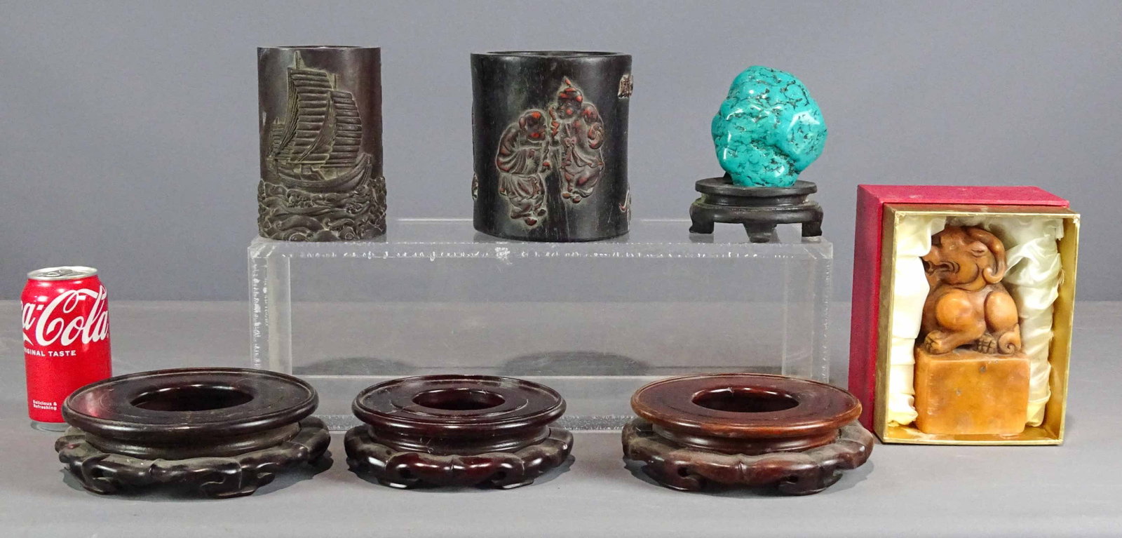 Asian Lot: Asian lot including (2) brush pots (6" Ht.), (3) bases, stone on stand, cased stone stamp.