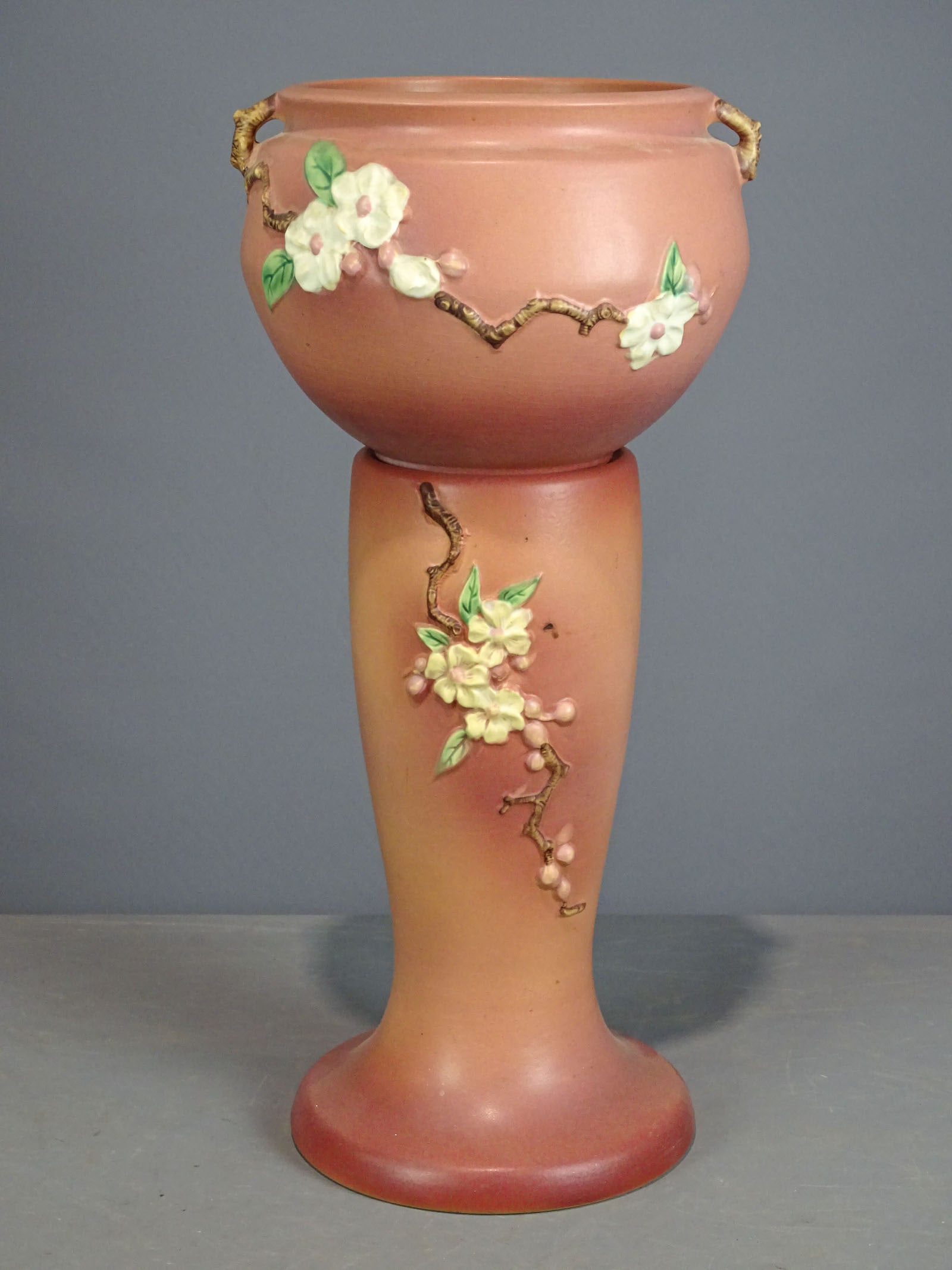 Roseville Jardiniere and Pedestal: Roseville Jardiniere and pedestal. Barbara Packer Collection. 25" Ht.. Crazing throughout, otherwise good condition.