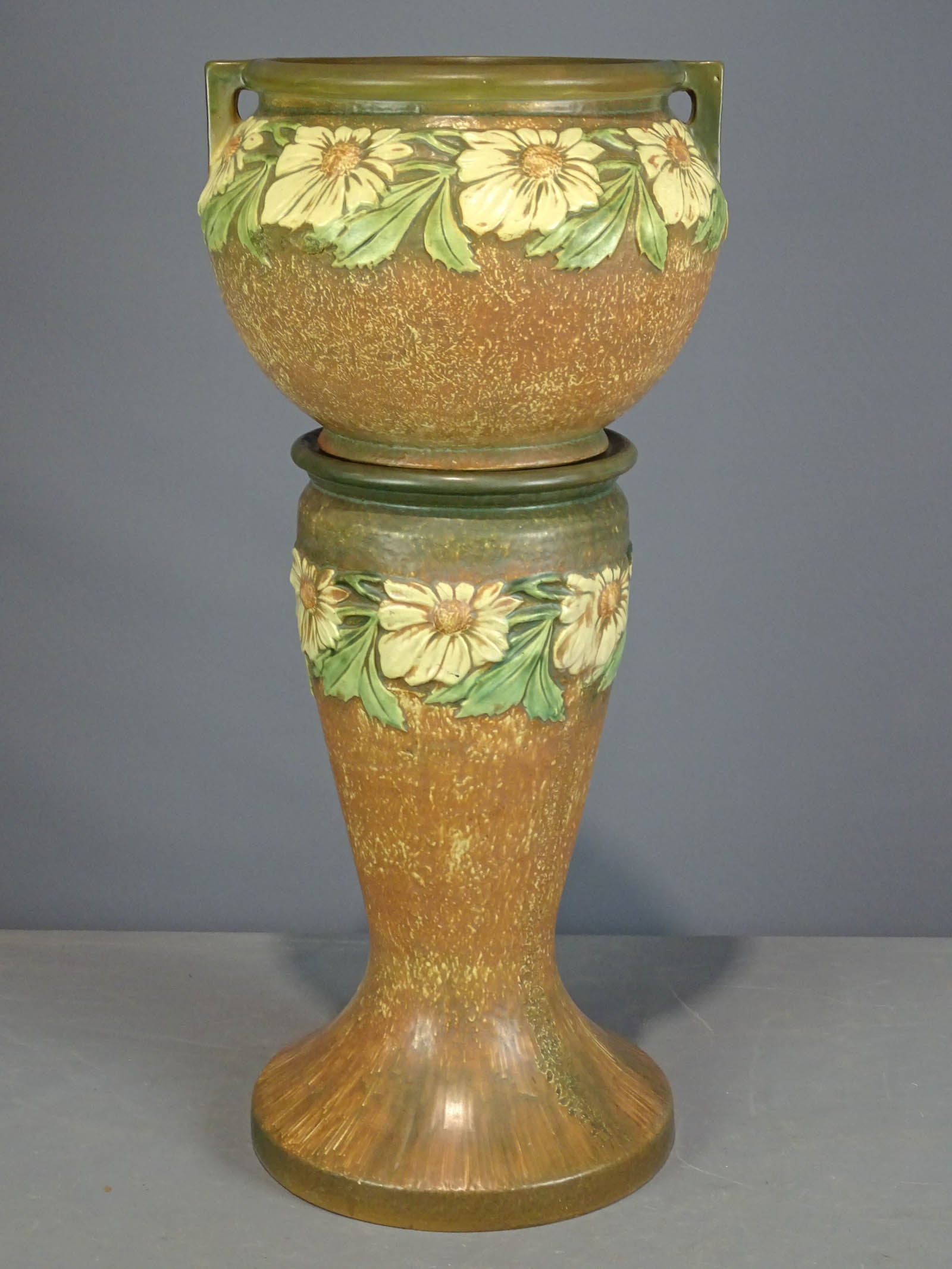Roseville Jardiniere and Pedestal: Roseville Jardiniere and pedestal. Barbara Packer Collection. 31" Ht., old rim repair, otherwise good condition.