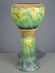 Roseville Jardiniere and Pedestal: Roseville Jardiniere and pedestal. Barbara Packer Collection. 28 1/2" Ht.. Top of pedestal has some imperfections as seen in images, otherwise good condition.