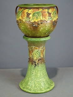 Roseville Jardiniere and Pedestal: Roseville Jardiniere and pedestal. Barbara Packer Collection. 29" Ht.. Base has some paint splashes, some spidering base of pedestal, otherwise good condition.