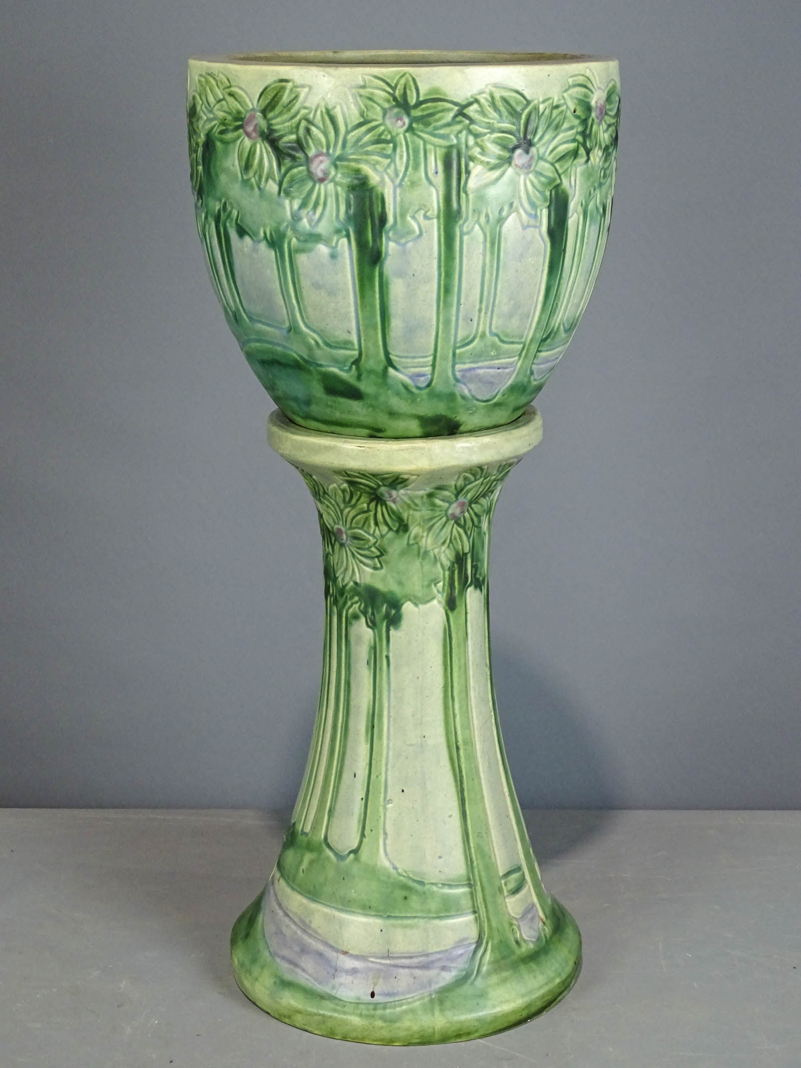 Roseville Jardiniere and Pedestal: Roseville Jardiniere and pedestal. Barbara Packer Collection. 28" Ht.. Top has hairline, base has some light scratches, otherwise good condition.