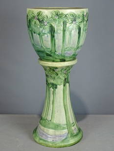 Roseville Jardiniere and Pedestal: Roseville Jardiniere and pedestal. Barbara Packer Collection. 28" Ht.. Top has hairline, base has some light scratches, otherwise good condition.