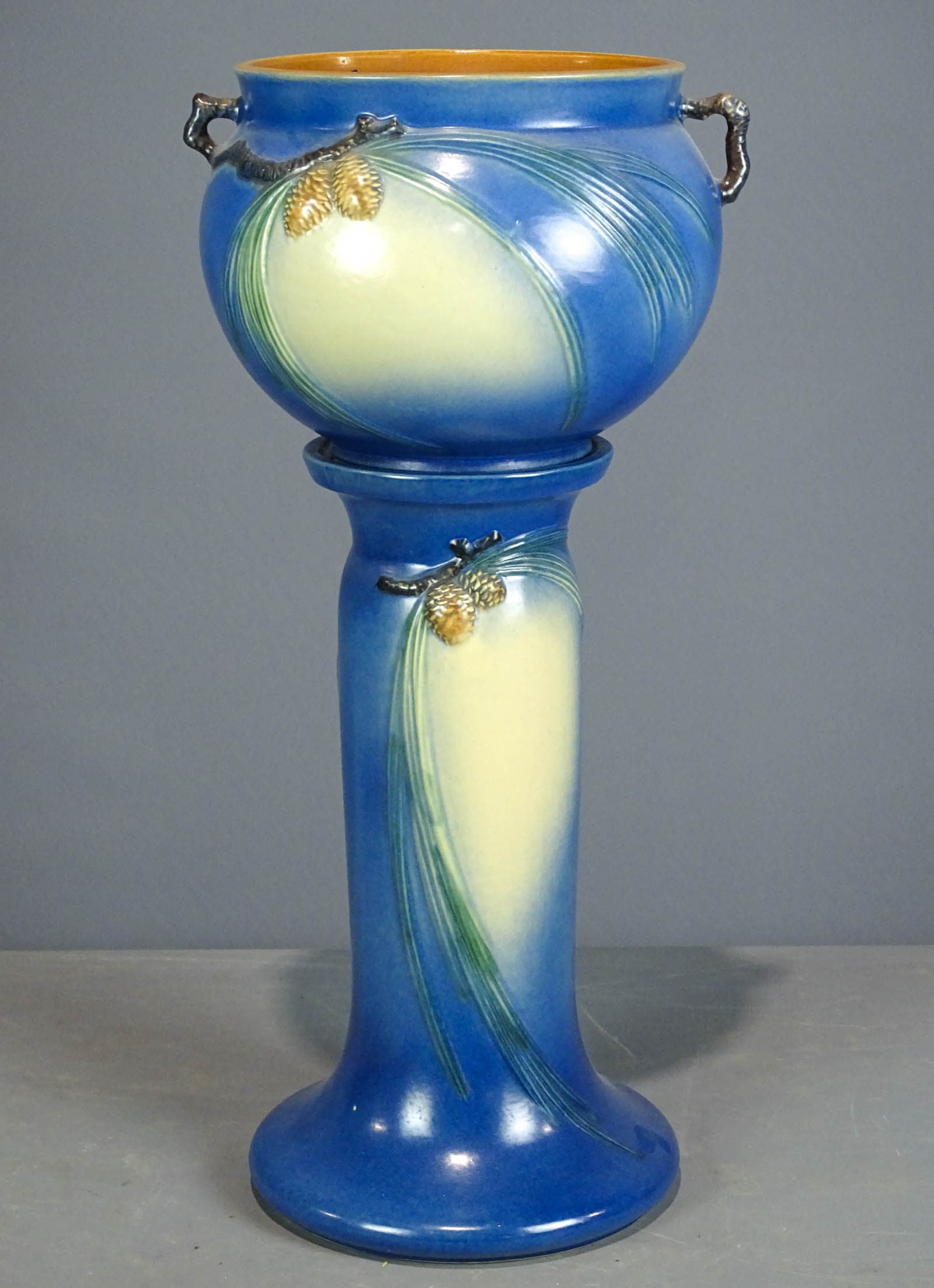 Roseville Jardiniere and Pedestal: Roseville Jardiniere and pedestal. Barbara Packer Collection. 25 1/2" Ht.. Overall good condition.