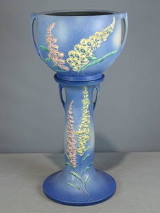 Roseville Jardiniere and Pedestal: Roseville Jardiniere and pedestal. Barbara Packer Collection. 31" Ht.. Base has some defects, chip, top has a line.