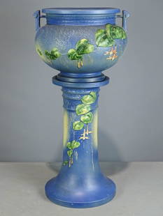 Roseville Jardiniere and Pedestal: Roseville Jardiniere and pedestal. Barbara Packer Collection. 33" Ht.. Overall good condition.