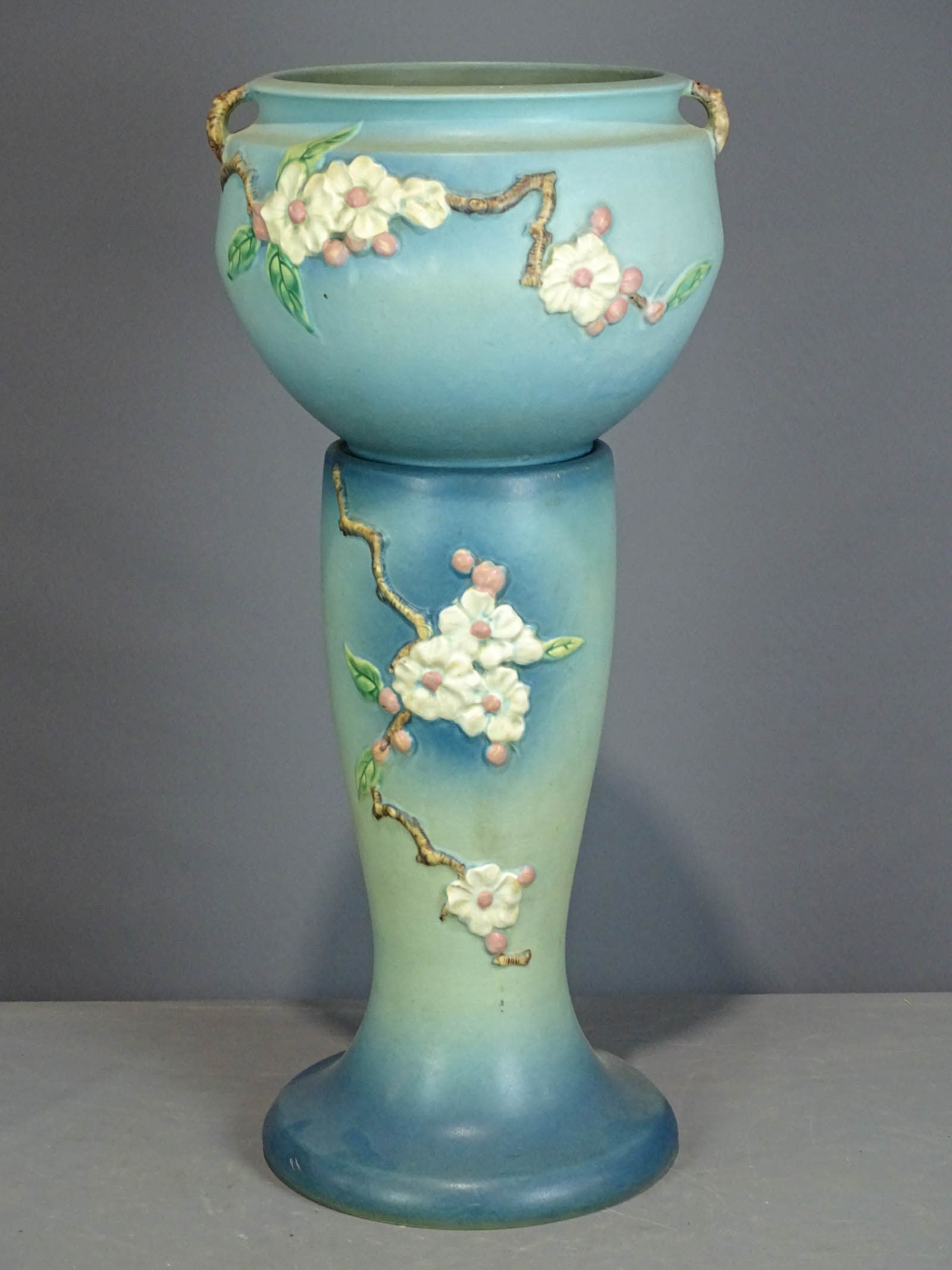 Roseville Jardiniere and Pedestal: Roseville Jardiniere and pedestal. Barbara Packer Collection. 31" Ht.. Crazing, light scratches, otherwise good condition.