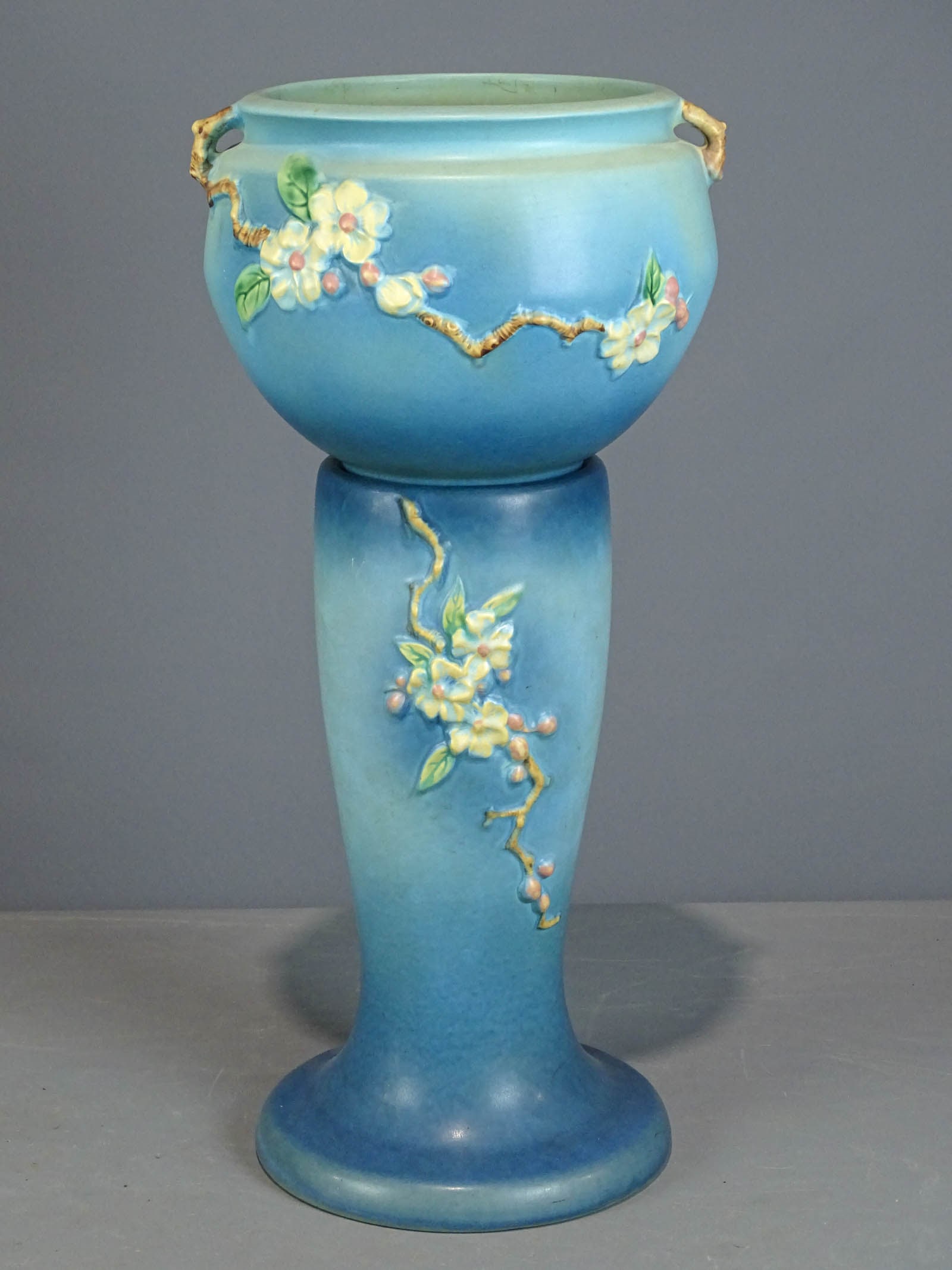Roseville Jardiniere and Pedestal: Roseville Jardiniere and pedestal. Barbara Packer Collection. 29" Ht..