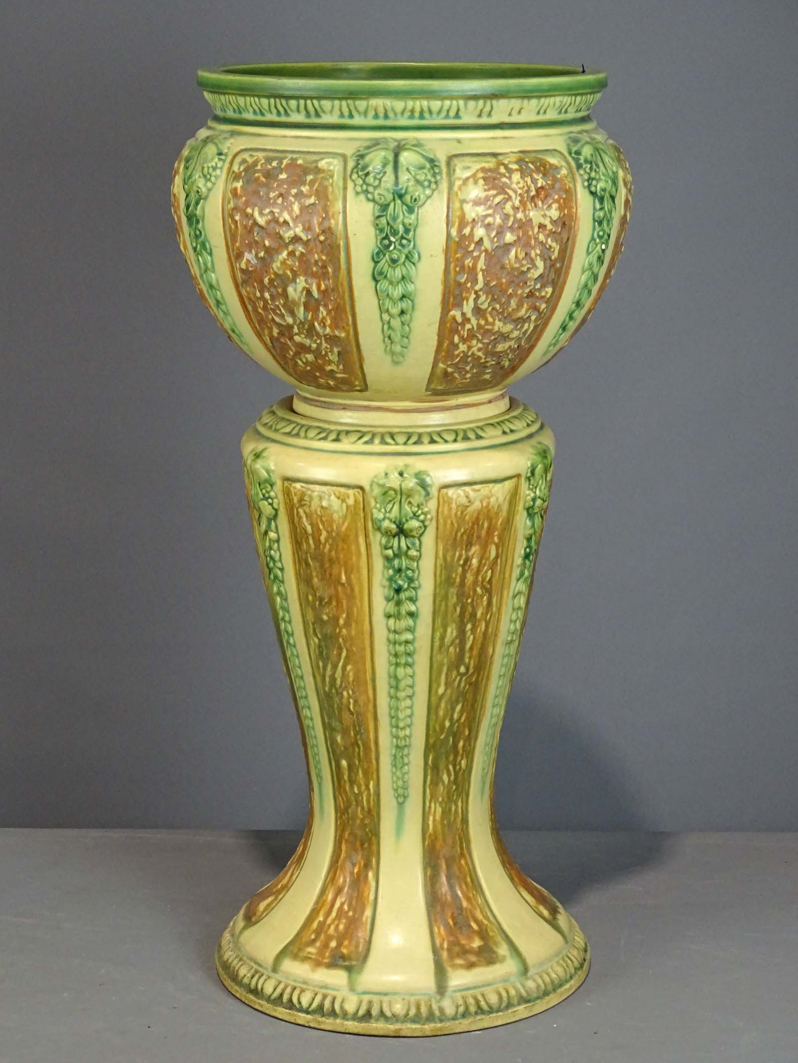 Roseville Jardiniere and Pedestal: Roseville Jardiniere and pedestal. Barbara Packer Collection. 29" Ht. Base good condition, top has (2) hairlines on rim and crack on base.
