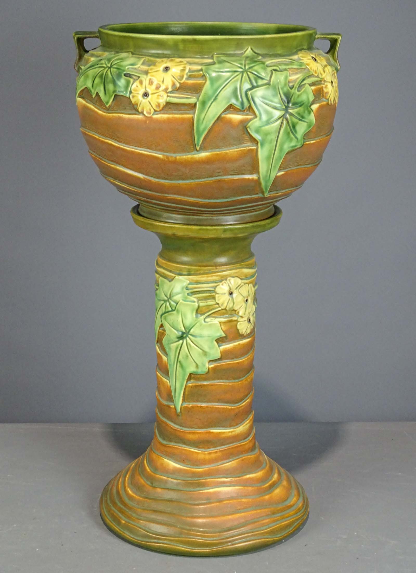 Roseville Jardiniere and Pedestal: Roseville Jardiniere and pedestal. Barbara Packer Collection. 29" Ht.. Good condition.