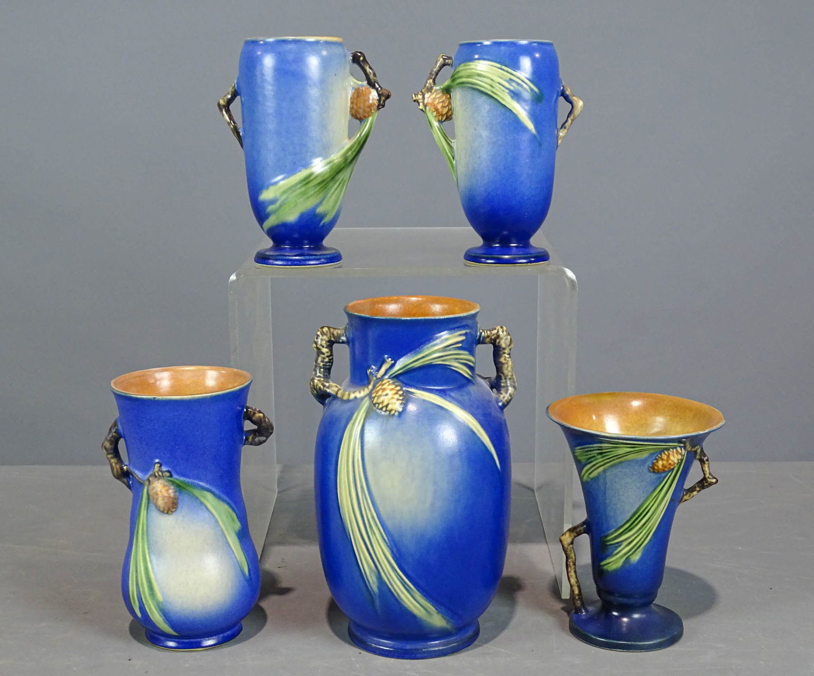 Roseville Lot: Lot (5) Roseville vases. Tallest 9 1/2" Ht.. Barbara Packer collection. Good condition.