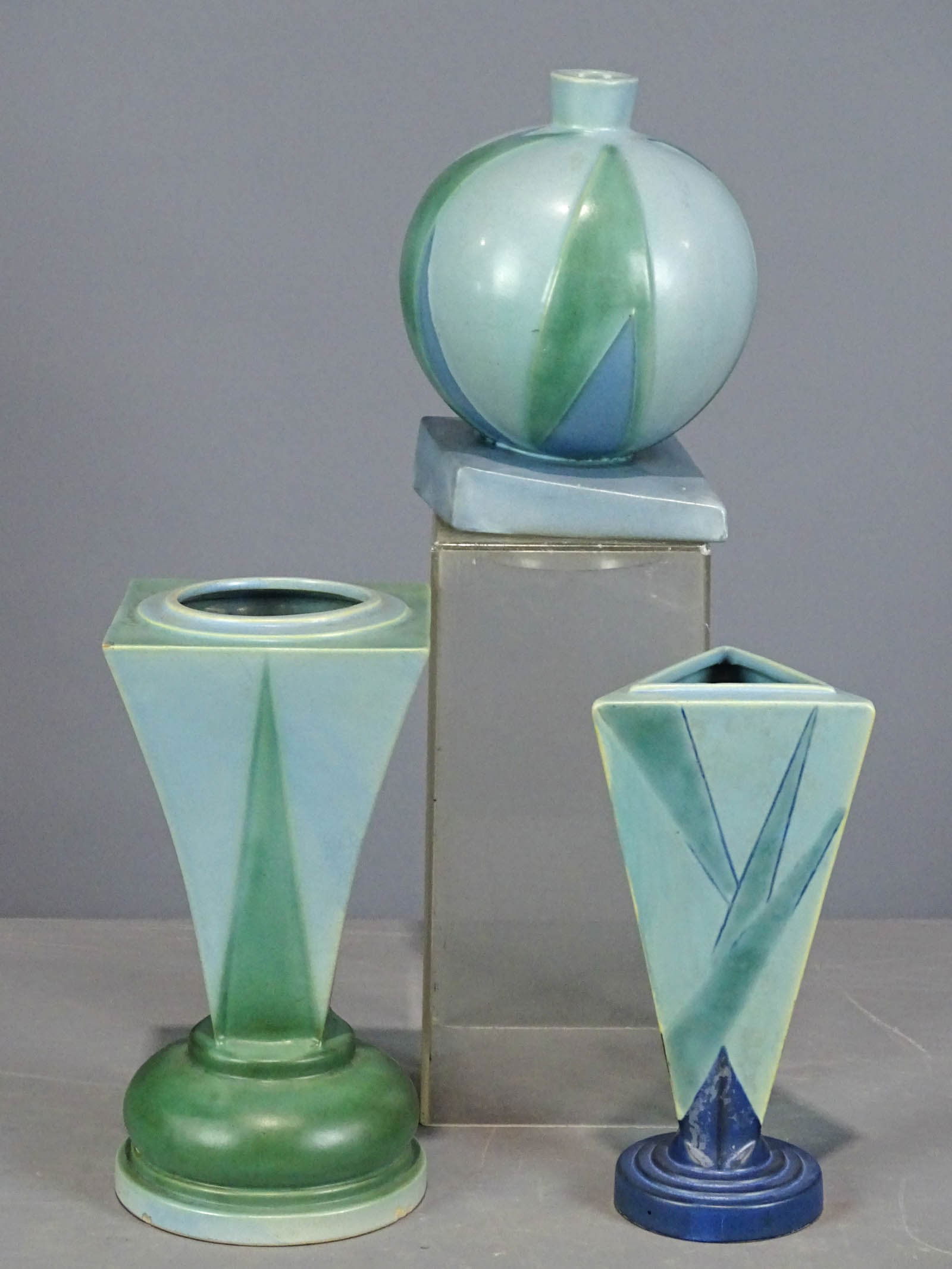 Roseville Lot: Lot (3) Roseville vases. Tallest 10" Ht. (corner nick, base nick), 9 1/2" Ht. (glaze imperfections), 8" Ht. (good condition, minor white mark base). Barbara Packer Collection.