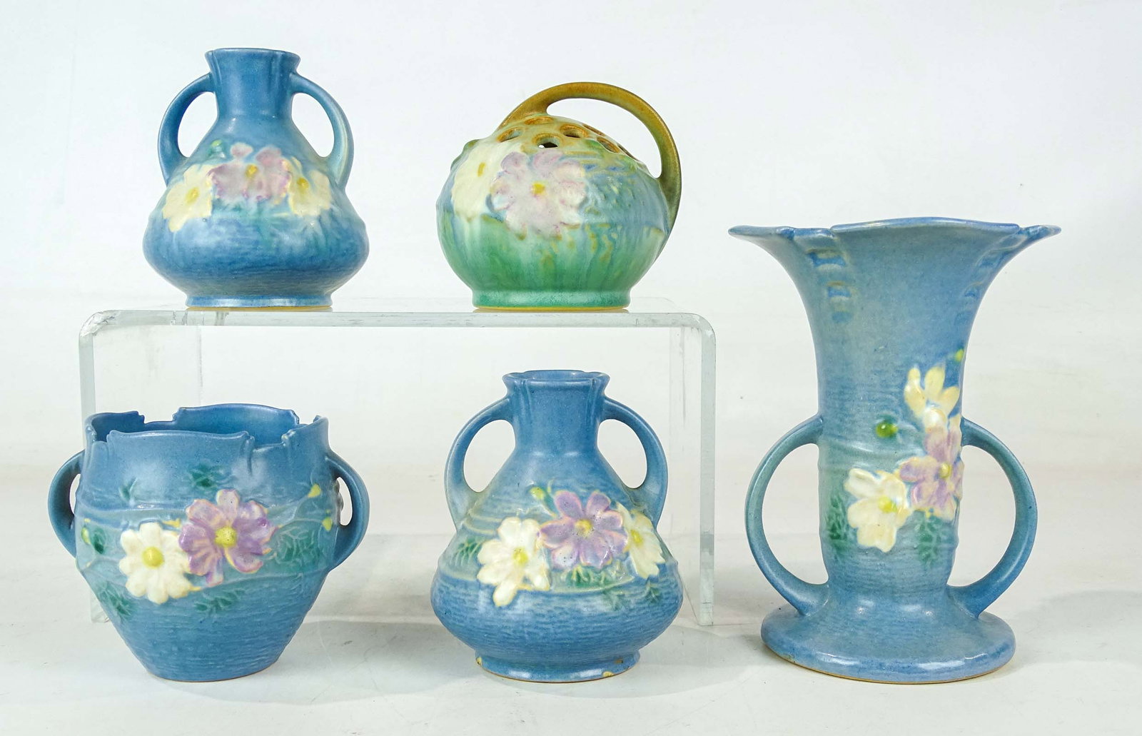 Roseville Lot: Lot (5) pieces of Roseville including flower fog and vases. Tallest 6 1/2" Ht.. Good condition. Barbara Packer Collection.