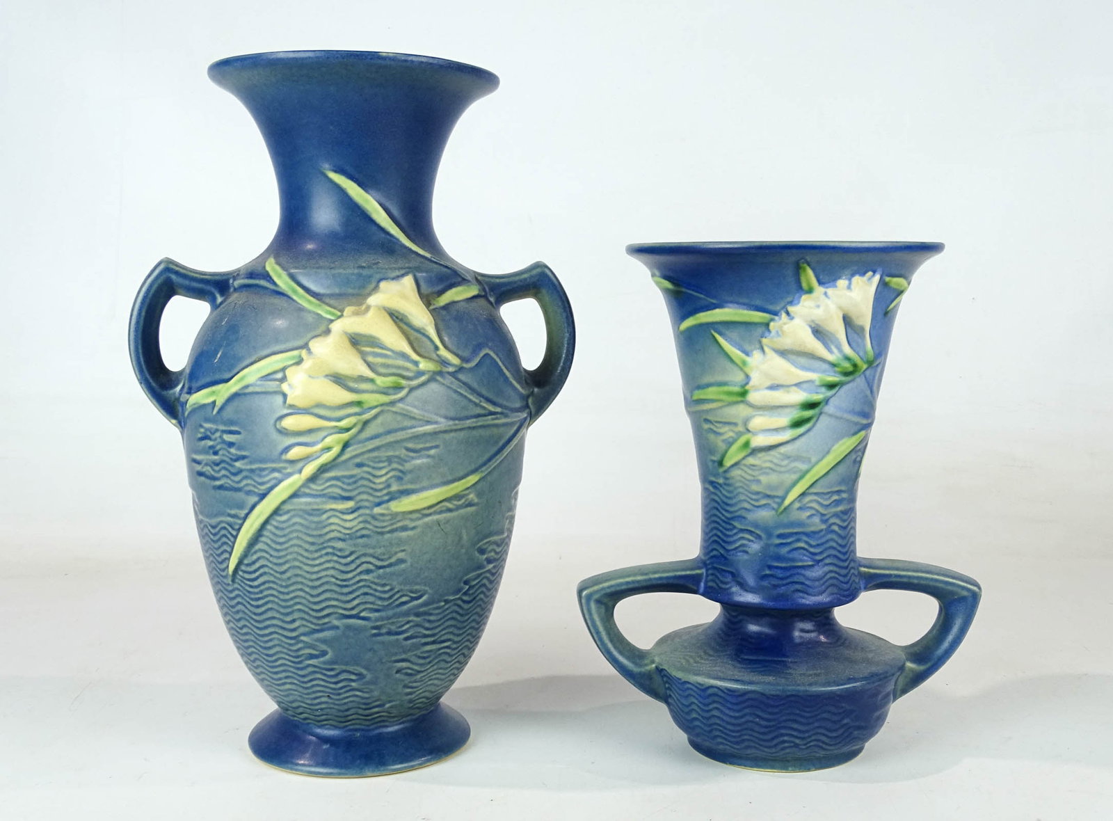 Roseville Lot: Lot (2) Roseville vases. Tallest 12 1/2" Ht.. Barbara Packer Collection. Good condition.