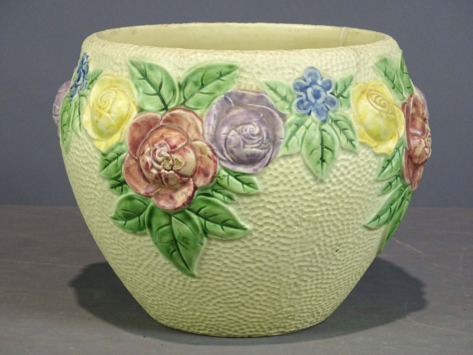 Roseville Jardiniere: Roseville jardiniere. 10" D., 9 1/2" Ht.. Good condition, staining to base interior. Barbara Packer Collection.