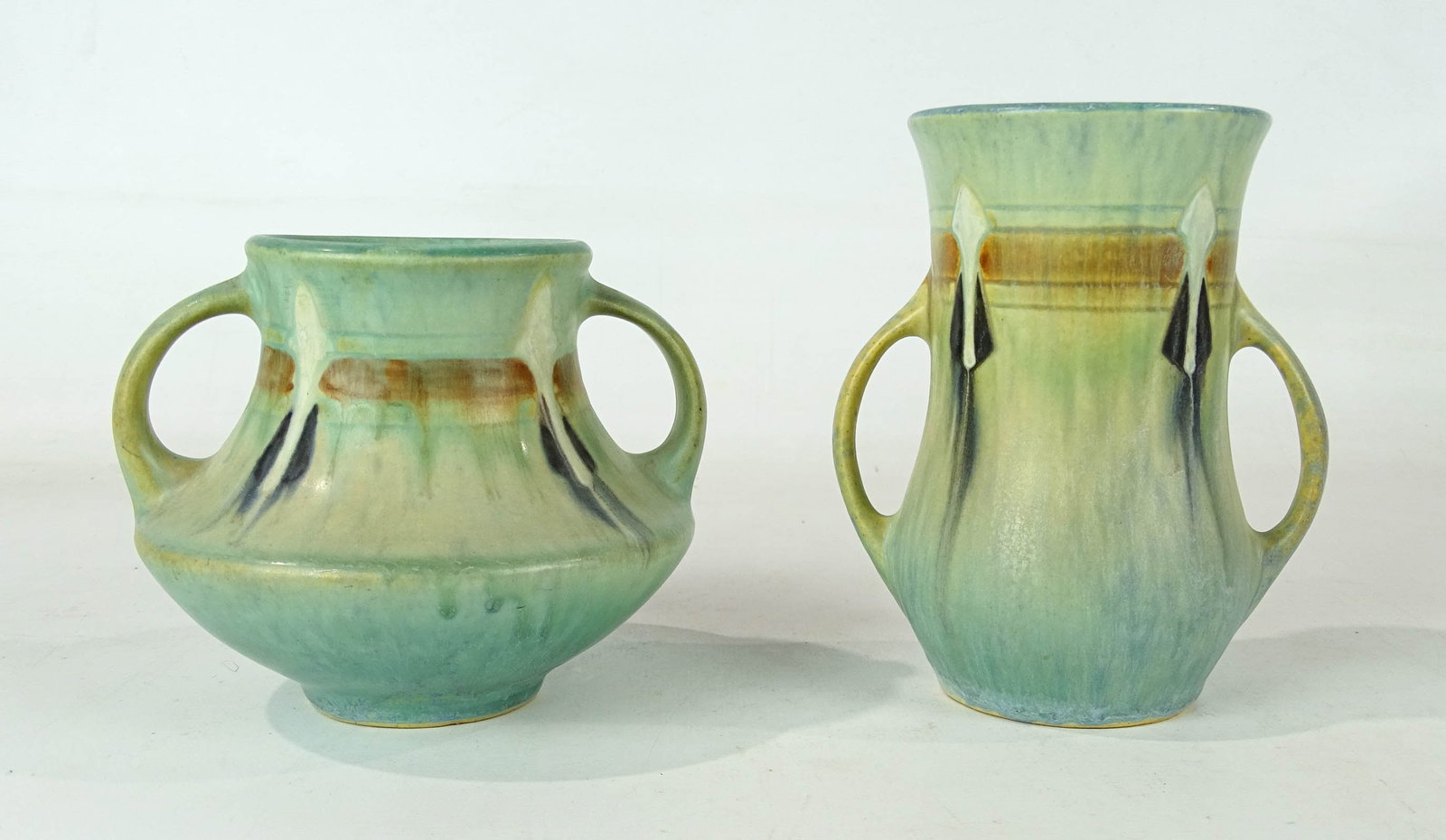 Roseville Lot: Lot (2) Roseville vases. Tallest 5 1/2" Ht.. Barbara Packer Collection. Good condition.