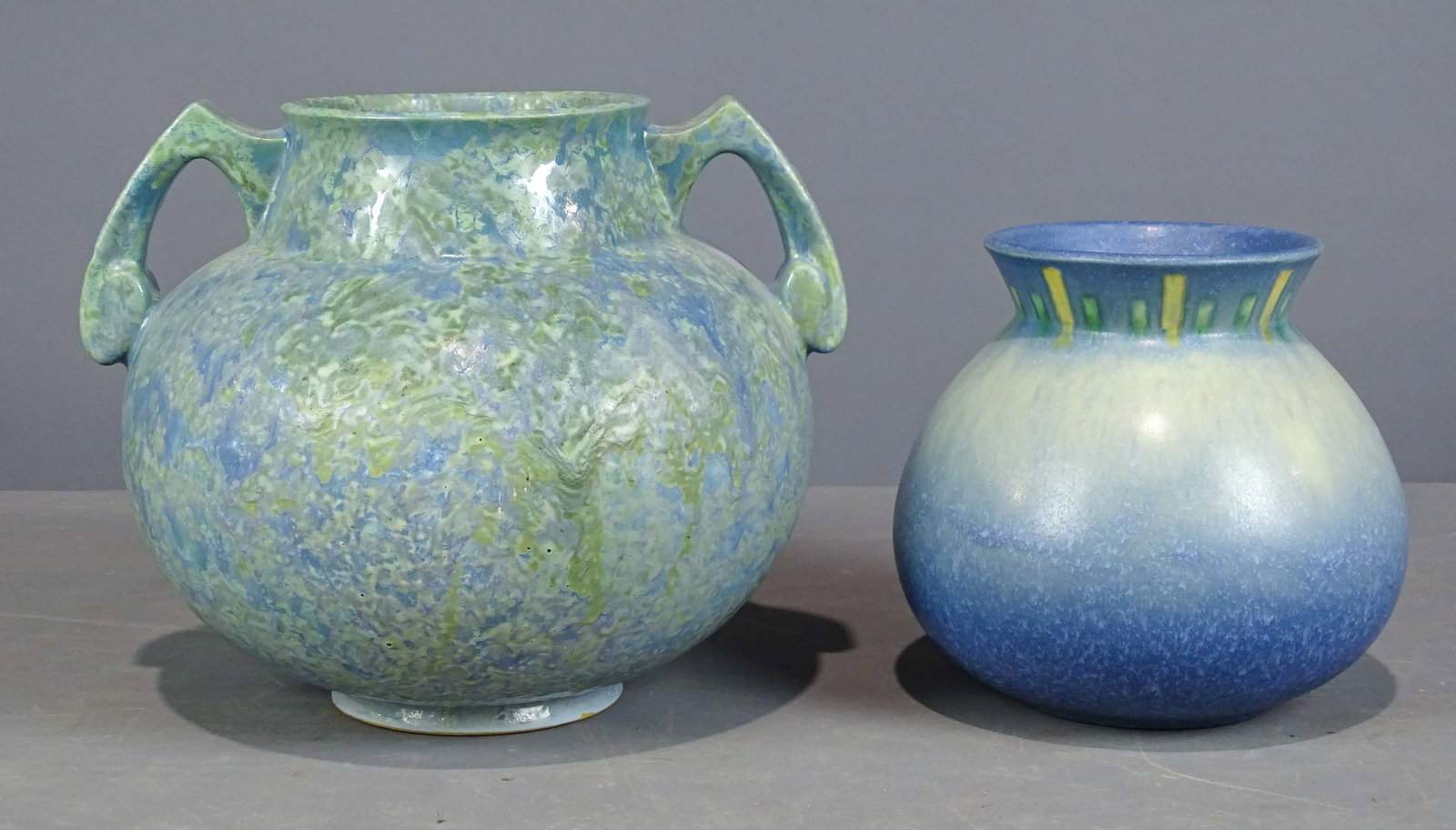 Roseville Lot: Lot (2) Roseville vases. Tallest 8 1/2" Ht.. Good condition.