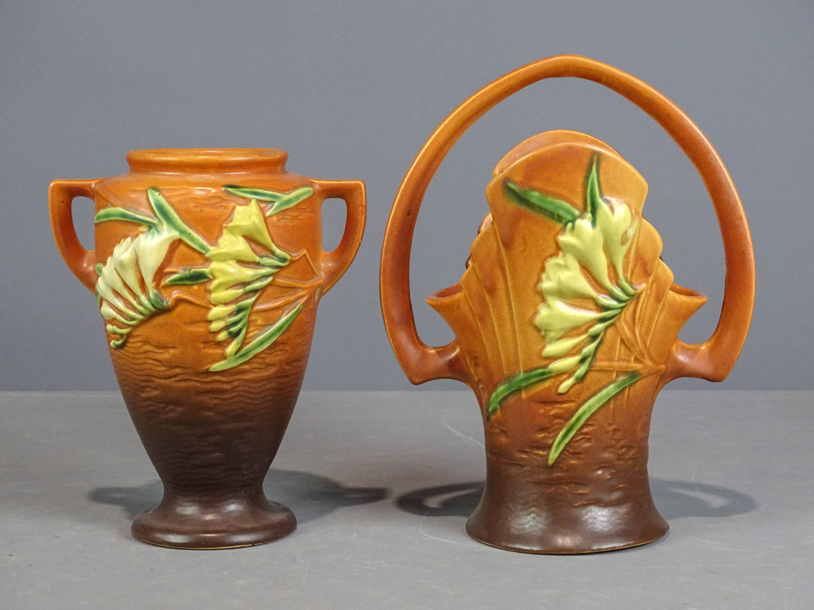 Roseville Lot: Lot (2) Roseville vases. Tallest 10 1/2" Ht.. Barbara Packer Collection. Good condition.