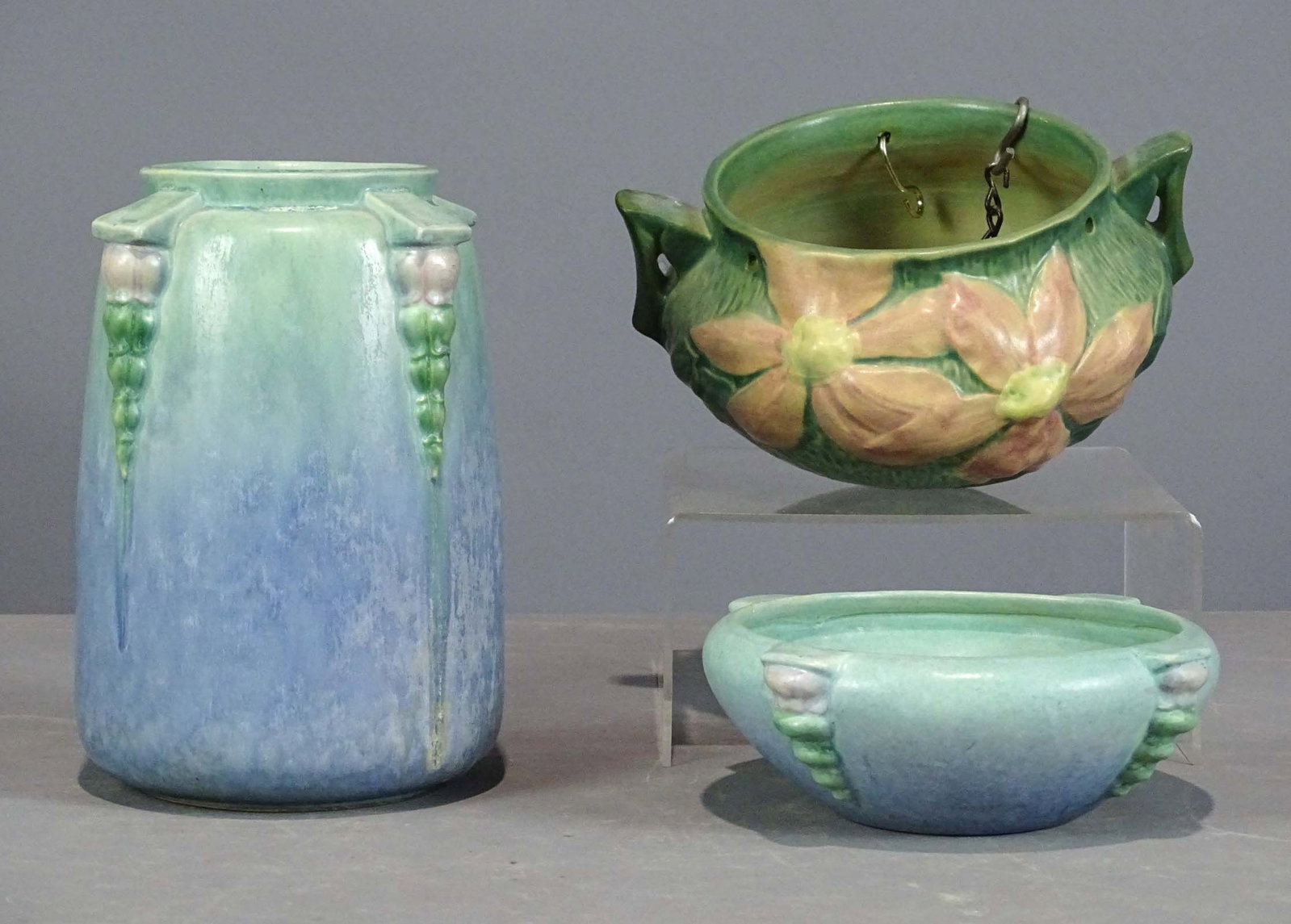 Roseville Lot: Lot (3) pieces of Roseville including vase (8 1/2" Ht.), hanging planter (interior scratches, 8" D., 6" Ht.), bowl (6 1/2" D.). Barbara Packer Collection. Good condition.