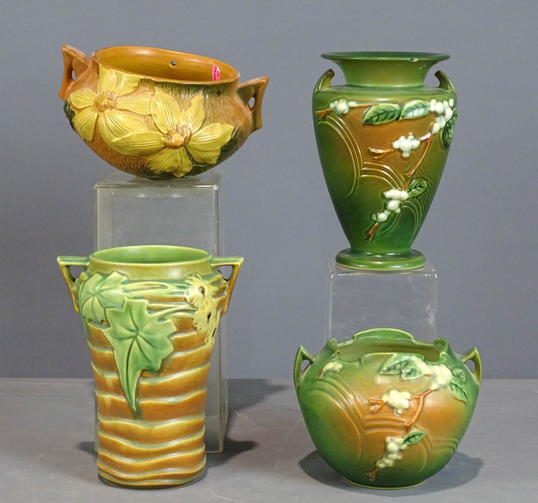 Roseville Lot: Lot (4) pieces of Roseville including (3) vases (one has small chip under rim, tallest 8 1/2" Ht., smallest has some interior rim staining, lines), hanging planter. Good condition unless noted. Barbar
