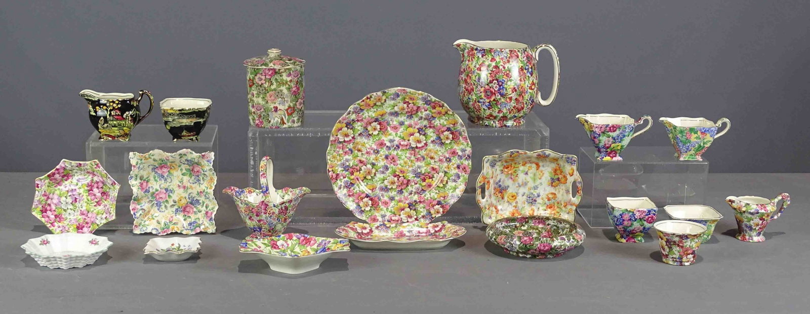 Chintz Pottery Lot: Chintz lot including Royal Winton Sunshine pitcher (5 1/2" Ht.) and basket, Ducal dish, Grimwades Somerset creamer, Royal Winton creamer, Du Barry creamer, tray, cup and plate, Royal Winton cream and 