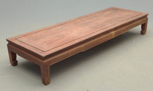 Asian Coffee Table: Asian teak (?) coffee table. Top 24" x 72", 12" Ht. Provenance David Webb Cross River N.Y. (jewelry designer).