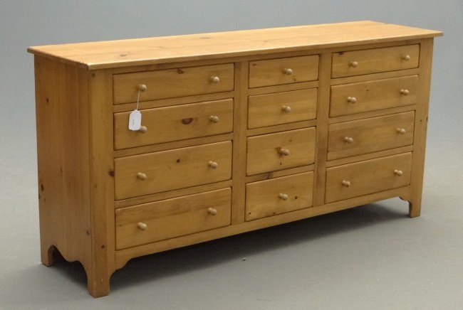 Pine Apothecary Chest: Contemporary pine twelve drawer apothecary cabinet. 66" W 17" D 33" Ht.