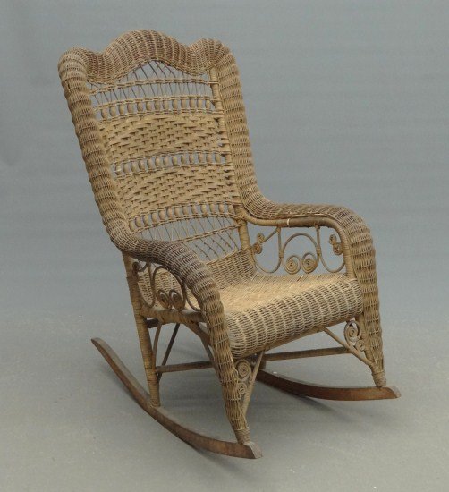 Wicker Rocking Chair: C. 1900's wicker rocking chair.