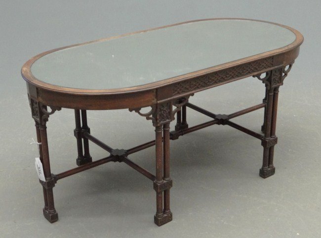 Coffee Table: Regency style mahogany mirrored top coffee table. Top 19 1/4" x 38 1/2", 17 1/4" Ht.
