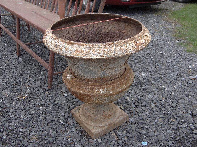 Cast Iron Urn: Cast iron urn. 23" Ht., 19 3/4" Diameter.