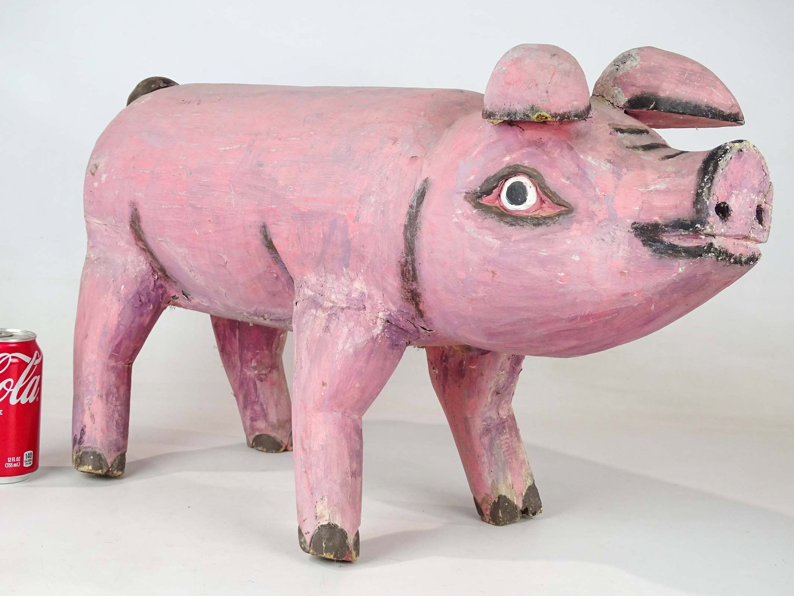 Folk Art Carved Wooden Pig: Folk art carved wooden pig. 24" L., 15" Ht..