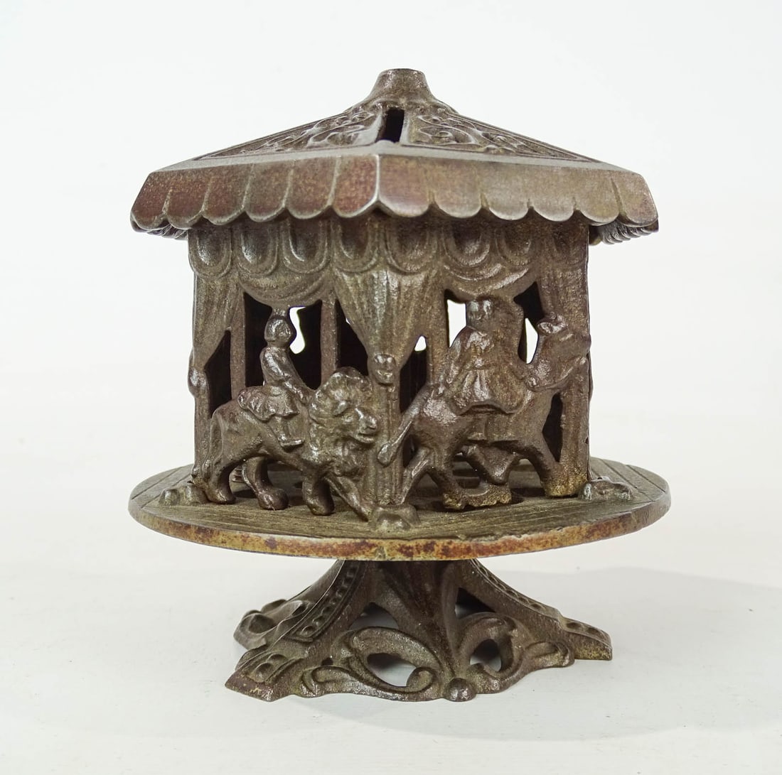 Carousel Bank: C. 1900 cast iron Grey Iron Co. Carousel bank. 5" Ht..