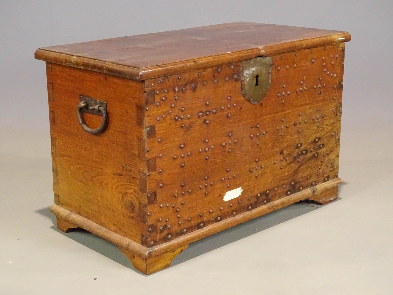 Hardwood Trunk: Hardwood tack decorated trunk. Lid loose.31 1/2" x 17 1/2" x 22" Ht..