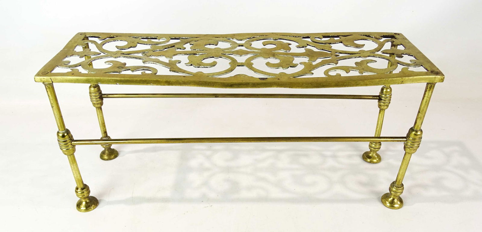 19th c. Brass Trivet: 19th c. brass trivet. 21 1/2" x 7" x 9 1/2" Ht..