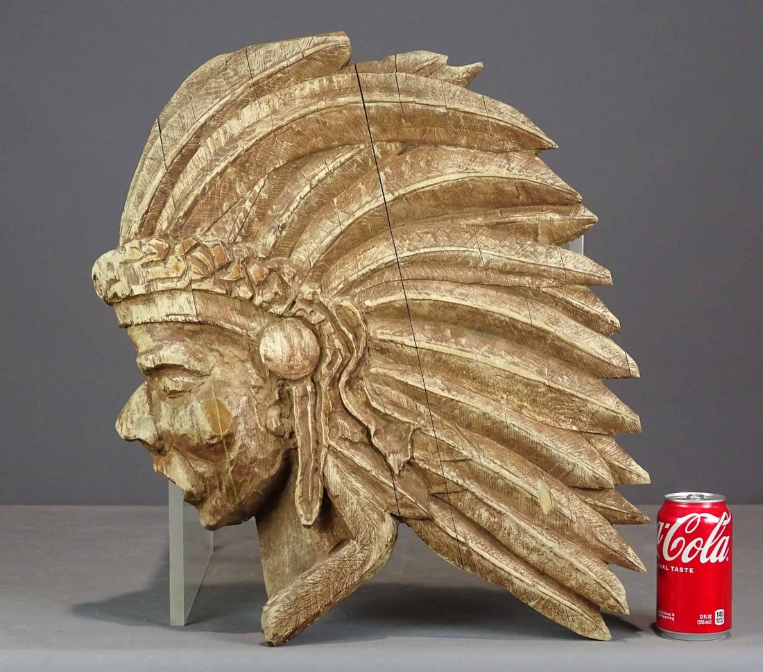 Carved American Indian Head: Carved American Indian head. 23" x 18", 3" thick.