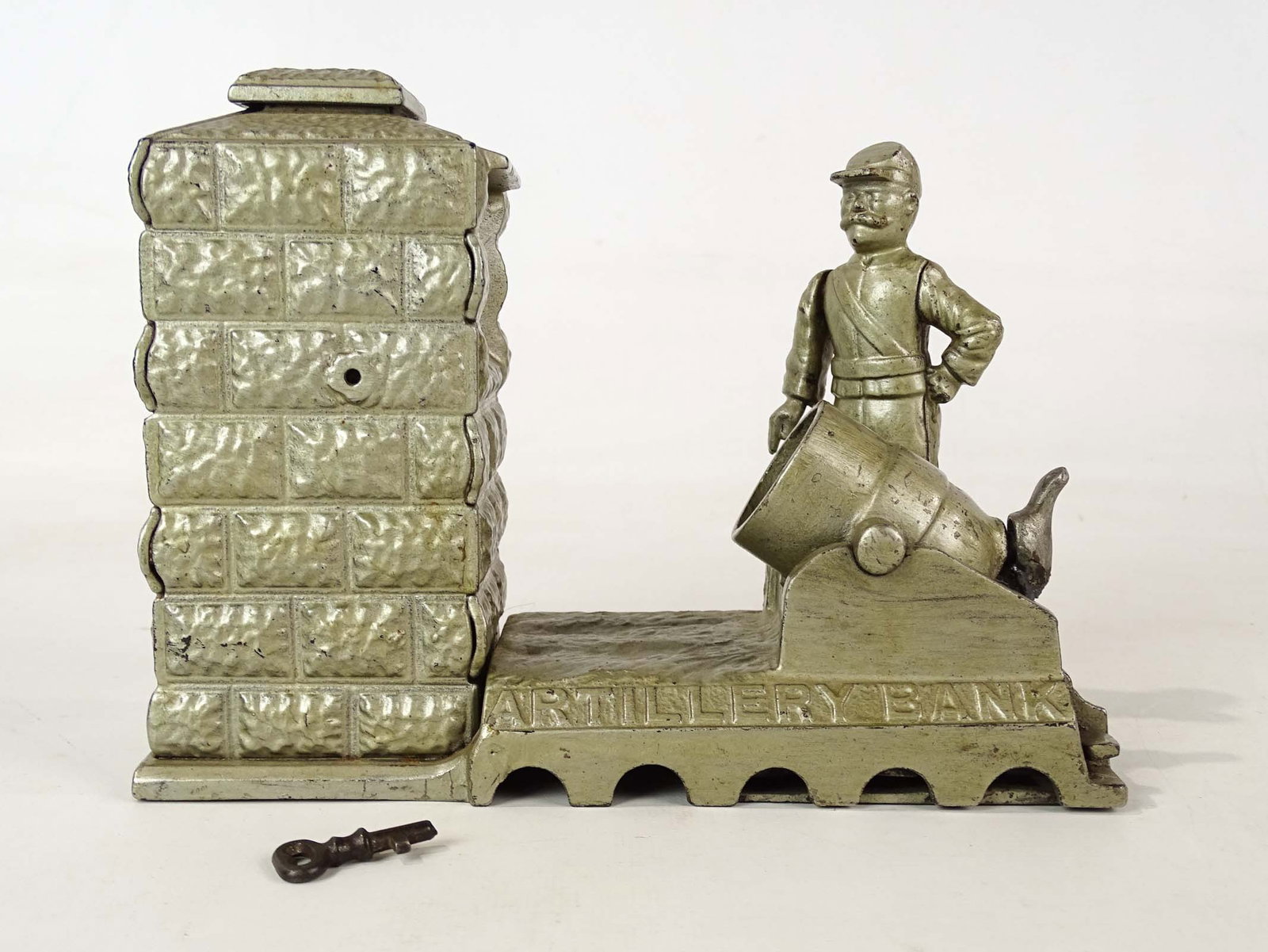Artillery Bank: Cast iron Artillery Mechanical bank.
