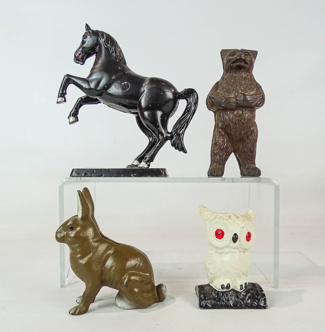 Bank Lot: Lot (4) cast iron banks including rearing horse, owl, rabbit and standing bear.