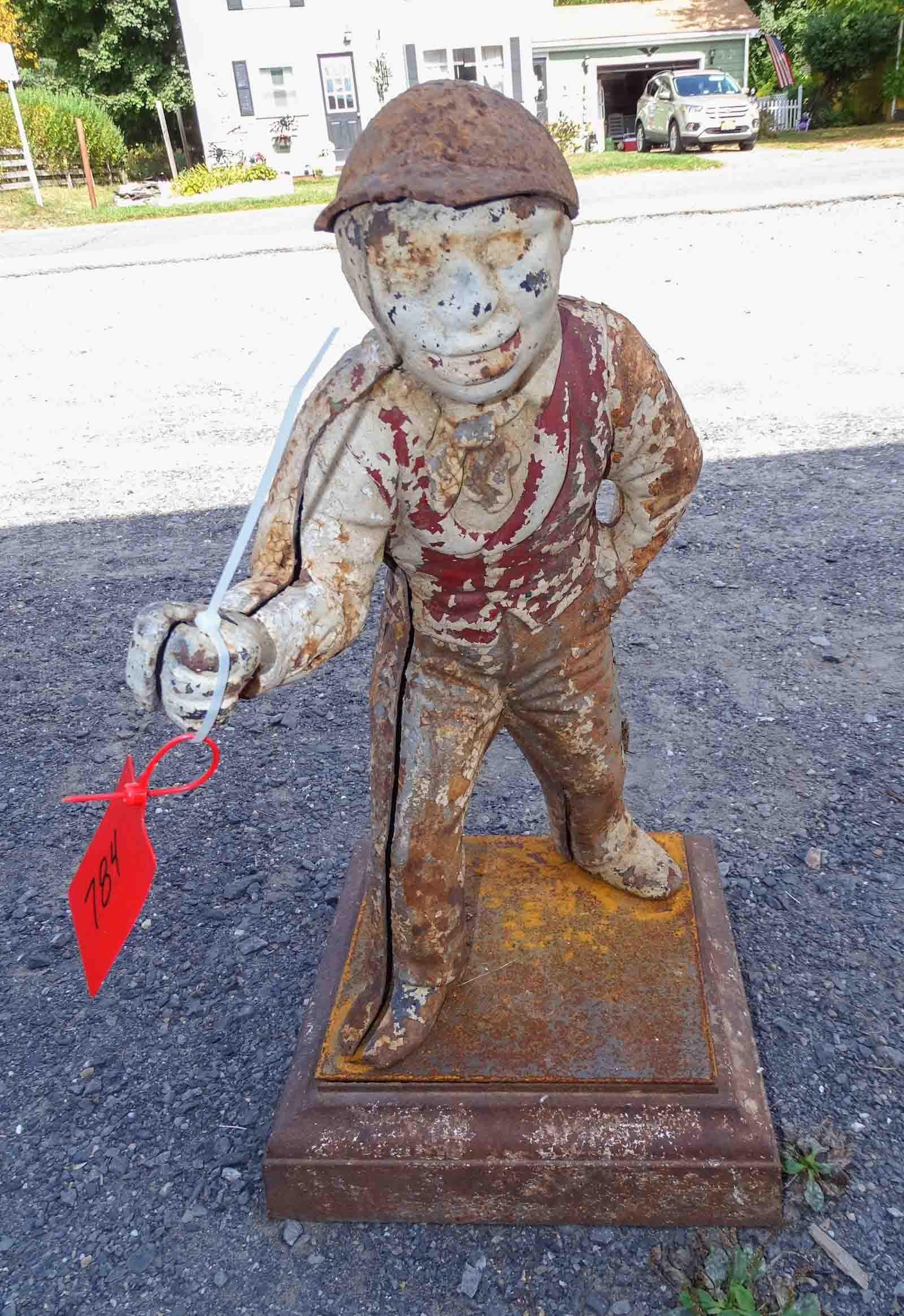 Cast Iron Jockey: Cast iron jockey. Some assembly required. 28" Ht., 14" square base.