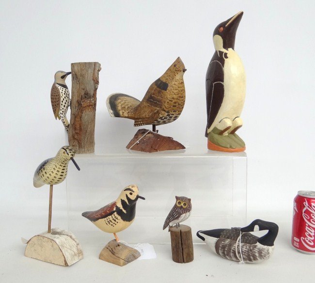 Folk Art Lot: Lot seven painted folk art carvings including shorebirds, Canada goose, owl (signed "Clark 69"), flicker signed "John Day", penguin.