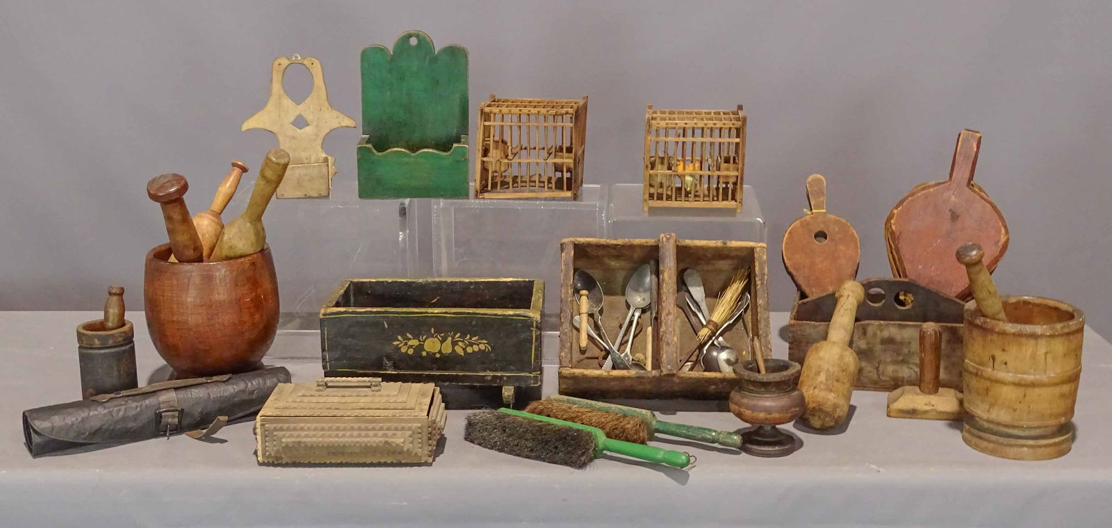Primitive Lot: Primitive lot: wall box in apple green paint 10" ht., segmented handled box, carved wall match box "Kissing birds" 8 1/2", segmented tool box with finger handle, (2) fireplace bellows, Tramp Art box,