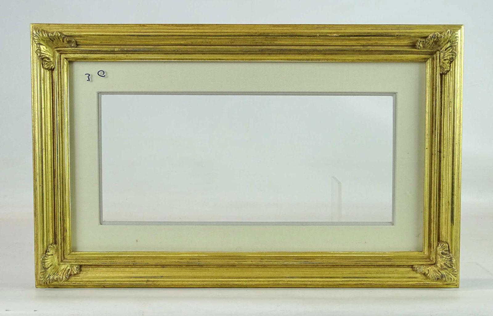Frame: American Federal style frame with Acanthus leaves. 22 karat gold leaf. 13" x 21", rabbet size 9 3/4" x 17 1/2".