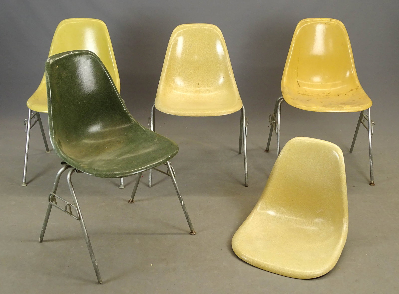 Herman Miller Chairs: Set of (4) vintage fiberglass Herman Miller chairs. Along with extra seat.