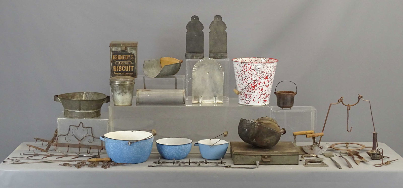 Metalware Lot: Misc. metalware lot including double wall sconce, pair sconces, trivet, hogscraper, candlebox, Tommy stick, Betty lamp, Agateware, tinware.