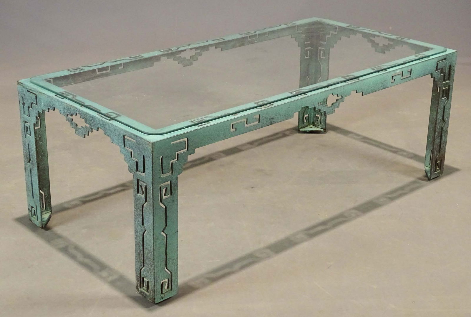 Glass Top Coffee Table: Glass top coffee table with metal bronze style base24" x 48" x 17 1/2".