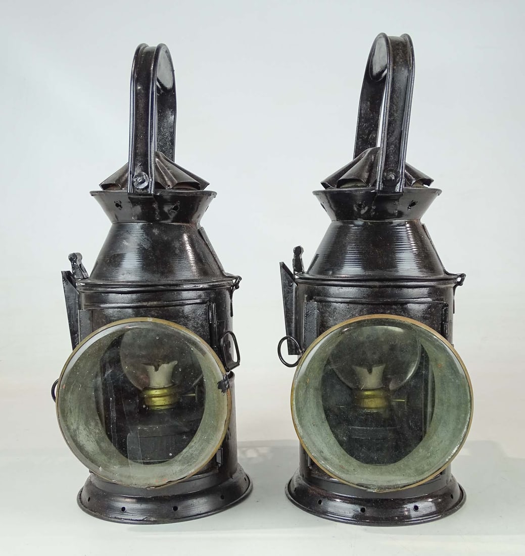 Pair of Lanterns: Pair of lanterns in black paint. 16" Ht..