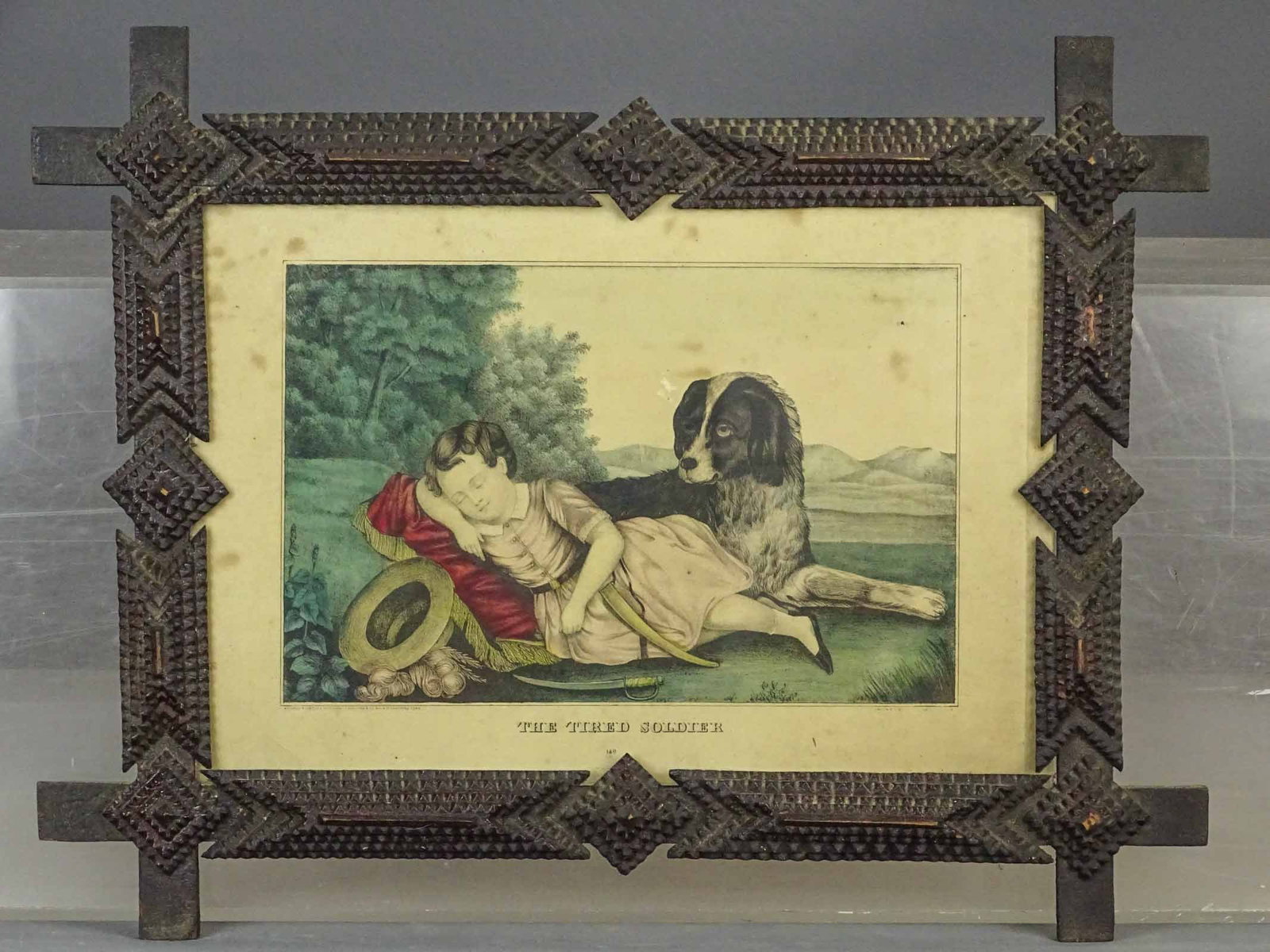 Tramp Art Frame: Early Tramp art frame with Kellogg print "THE TIRED SOLDIER". Overall 17" x 21 1/2".
