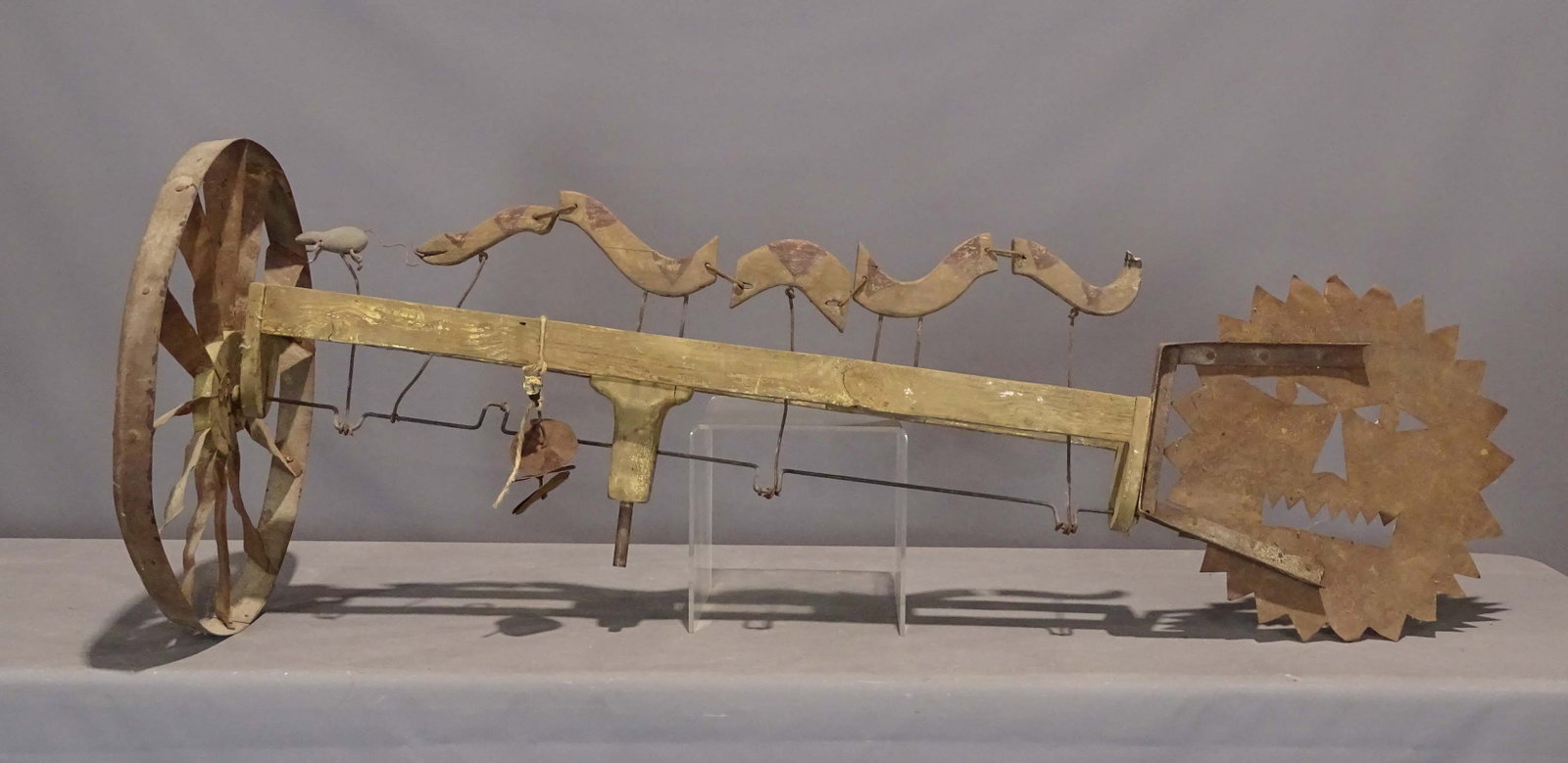 Whirligig: Snake chasing mouse and sun whirligig. 63" L..