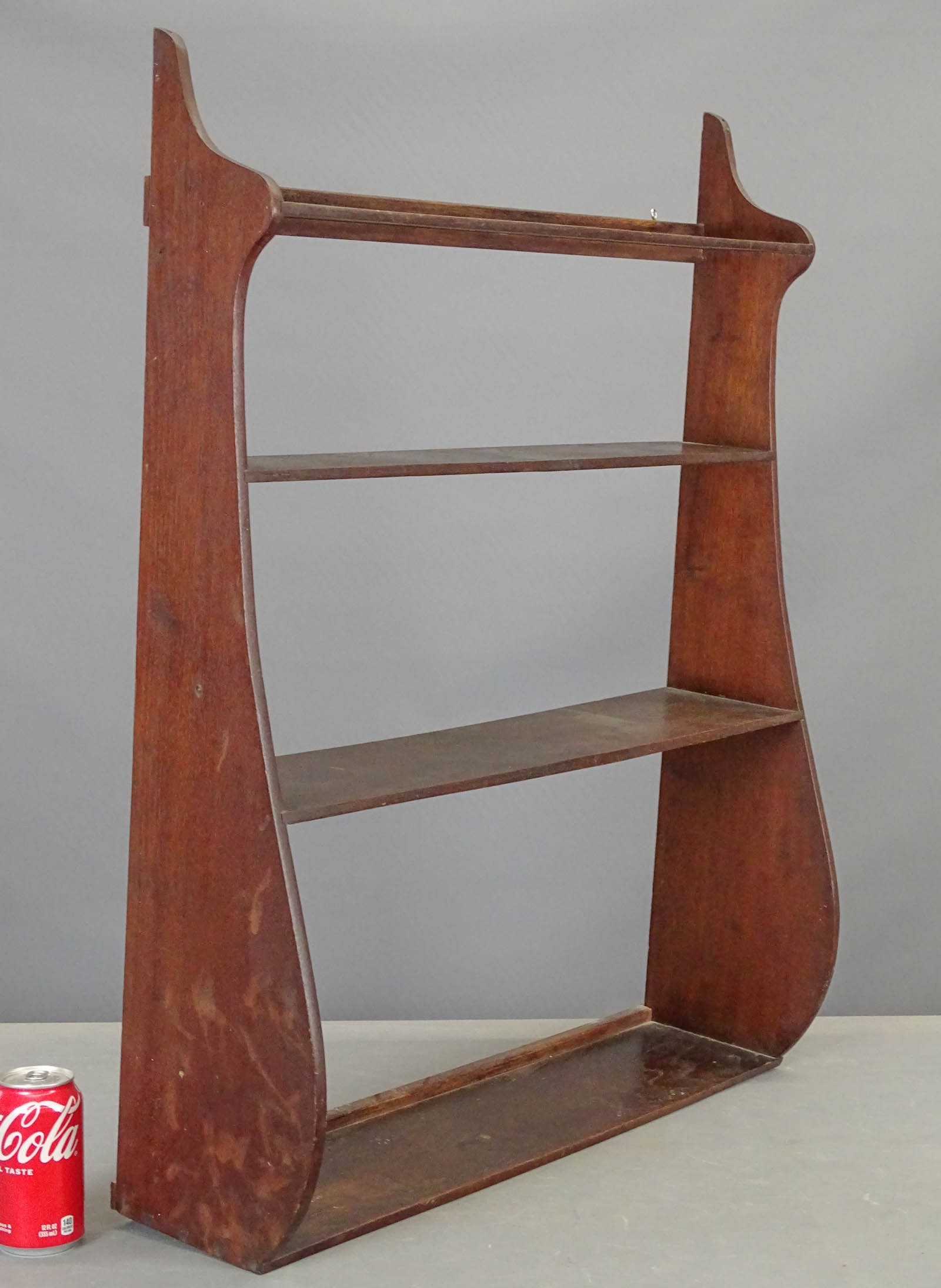 Early Whale Tail Shelf: Early "Whale Tail" hanging shelf. Dovetailed construction. 26 1/2" x 7 1/4" x 33 1/2".